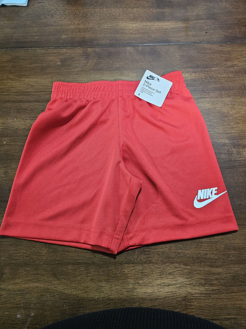 Nike Red Athletic Mesh Shorts with White Swoosh